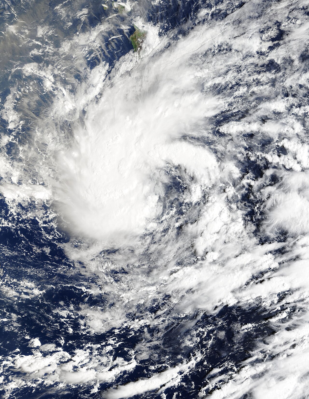 Satellite view of Tropical Storm Nolo’s broad cloud circulation south of Hawaii Island over the Pacific Ocean.