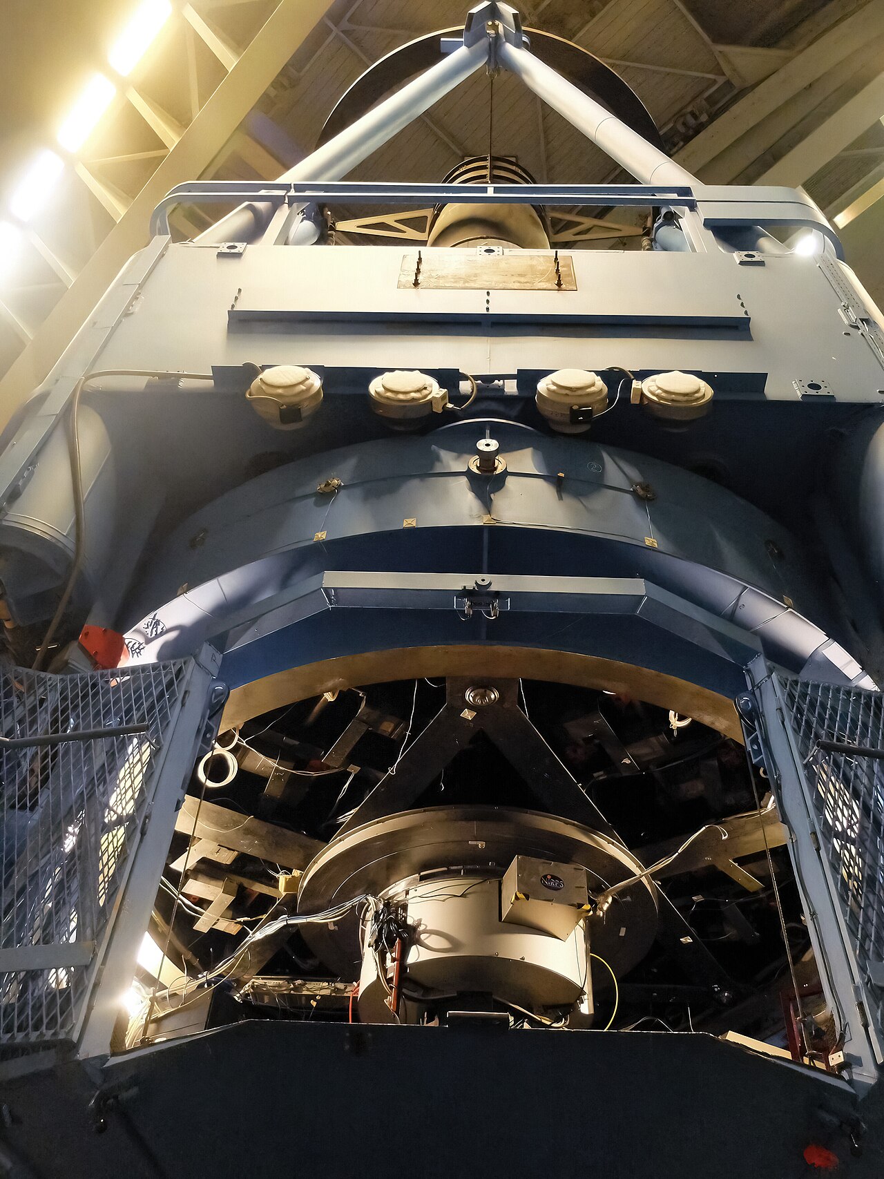 NIRPS instrument mounted beneath the primary mirror of ESO’s 3.6-metre telescope.